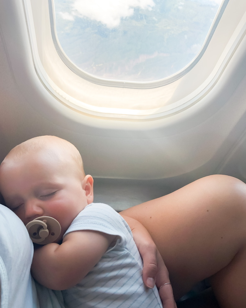 baby flying on plane